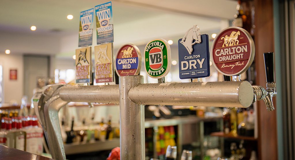 Bar area with beer taps at club venue