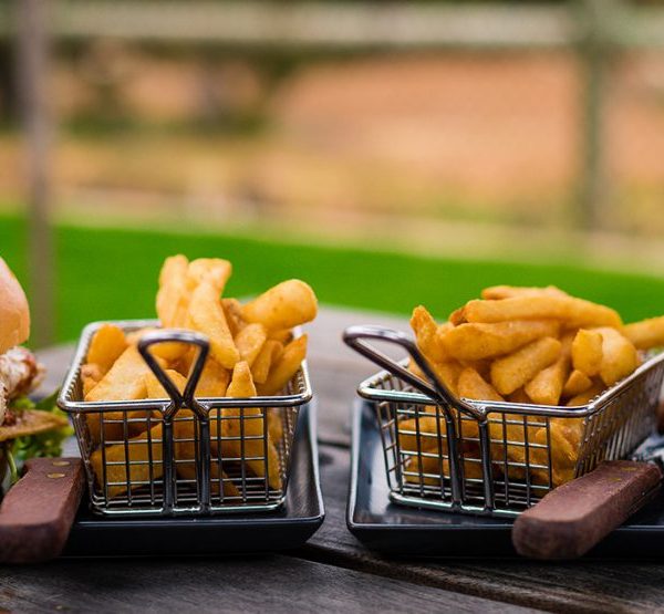 Burger and French fries on the plate