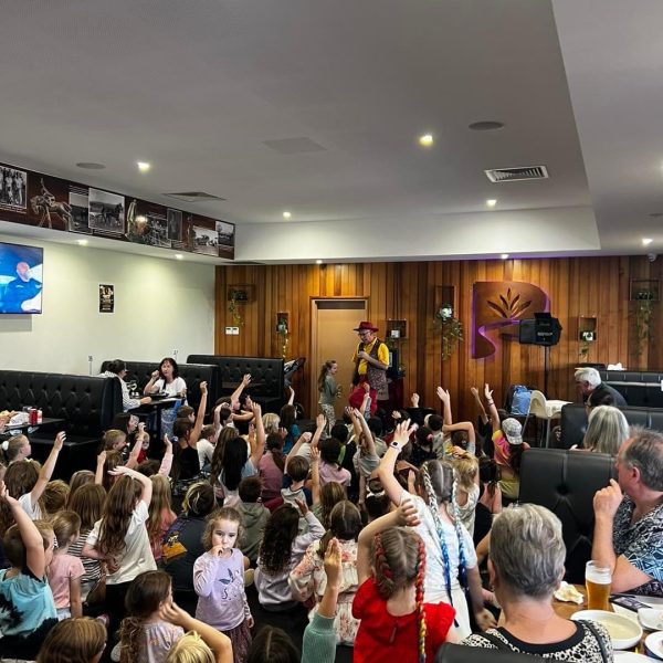 Children attending an indoor kids’ event at the club