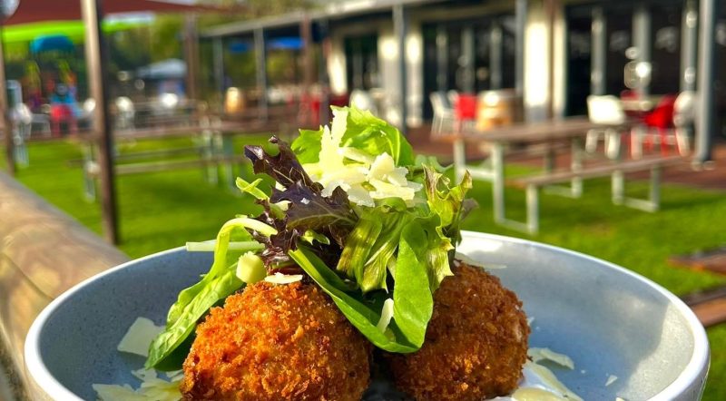 Fried croquettes served with salad