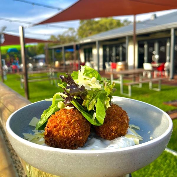 Fried croquettes served with salad