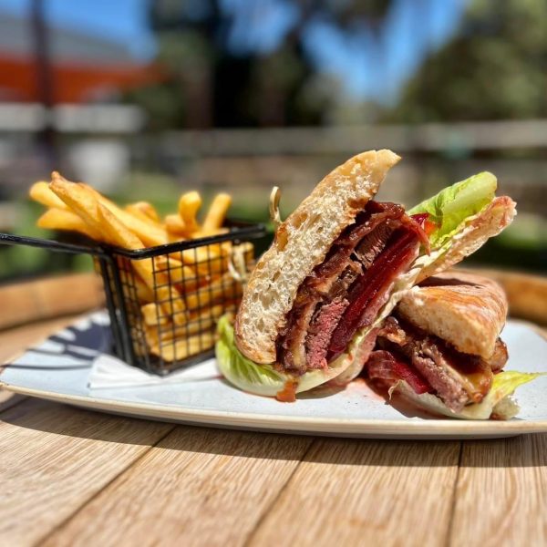 Burger and fries served on a plate